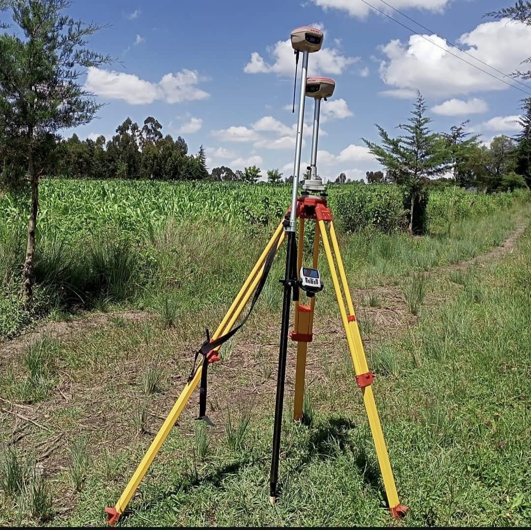 Survlution Kenya GNSS survey receiver on a tripod in a field in Kajiado