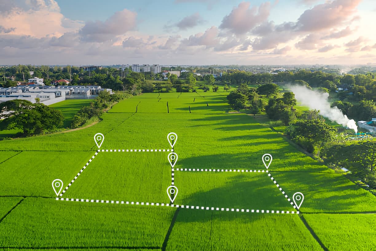 Aerial view of a land parcel with boundary beacon points marked